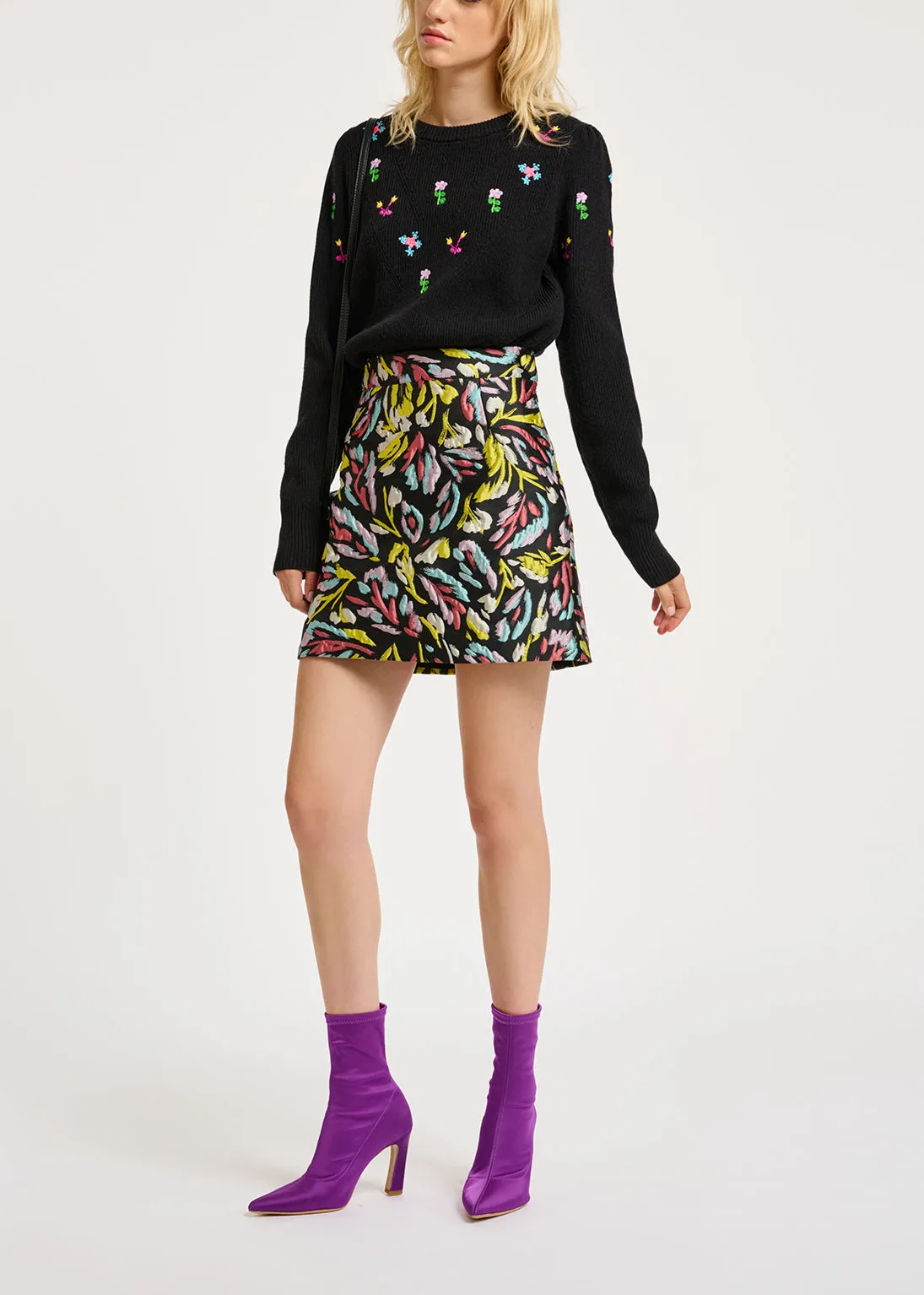 Black pointelle-knitted sweater with floral embroideries