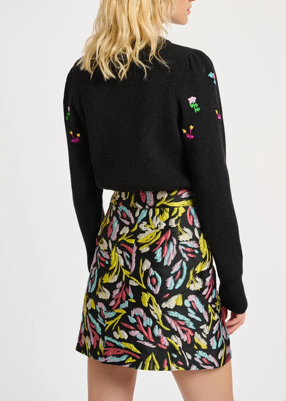 Black pointelle-knitted sweater with floral embroideries