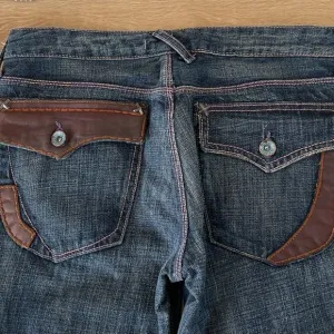 NWT Vintage Blue Cult Sacred Blue Leather Trim Jeans, Size 29; 34&quot; Inseam.
