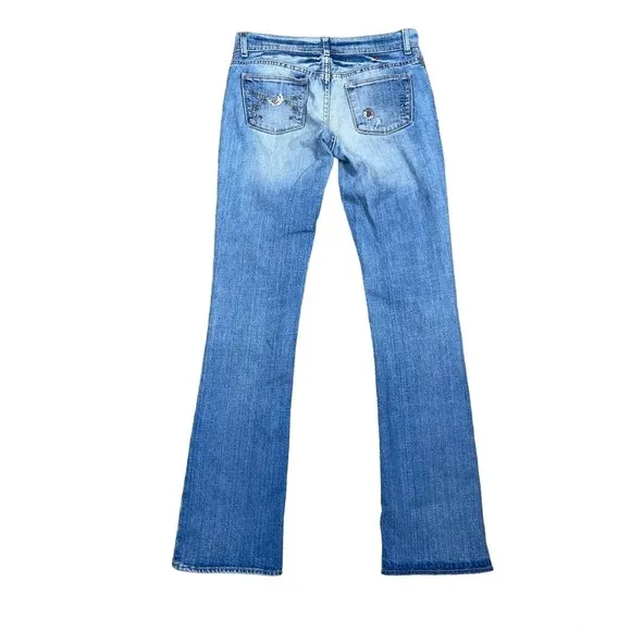 Ralph Lauren floral embroidered bootcut distressed bootcut jeans.