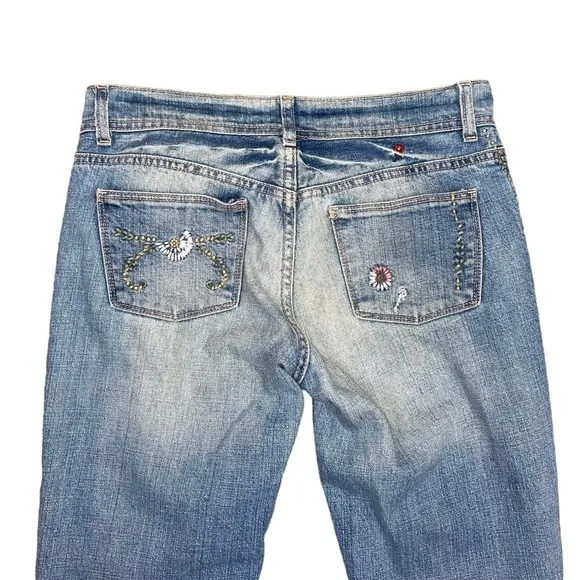 Ralph Lauren floral embroidered bootcut distressed bootcut jeans.