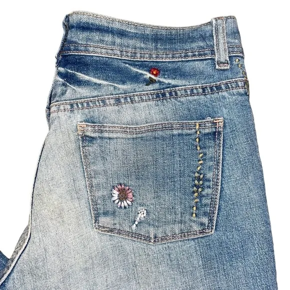 Ralph Lauren floral embroidered bootcut distressed bootcut jeans.