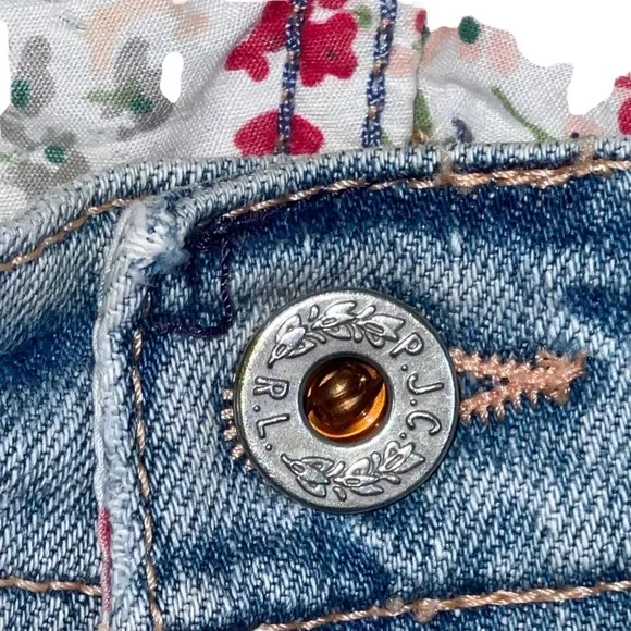 Ralph Lauren floral embroidered bootcut distressed bootcut jeans.