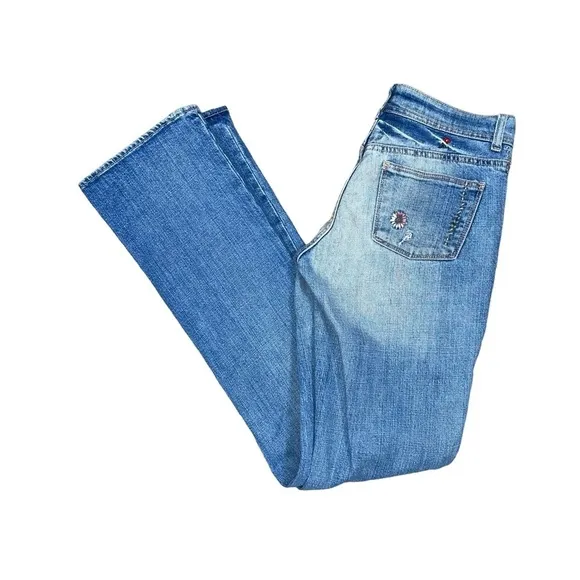 Ralph Lauren floral embroidered bootcut distressed bootcut jeans.