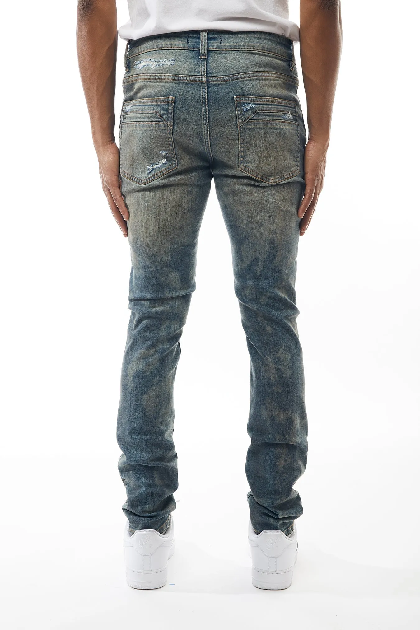 Ripped and Repaired Denim Jeans in Cobalt